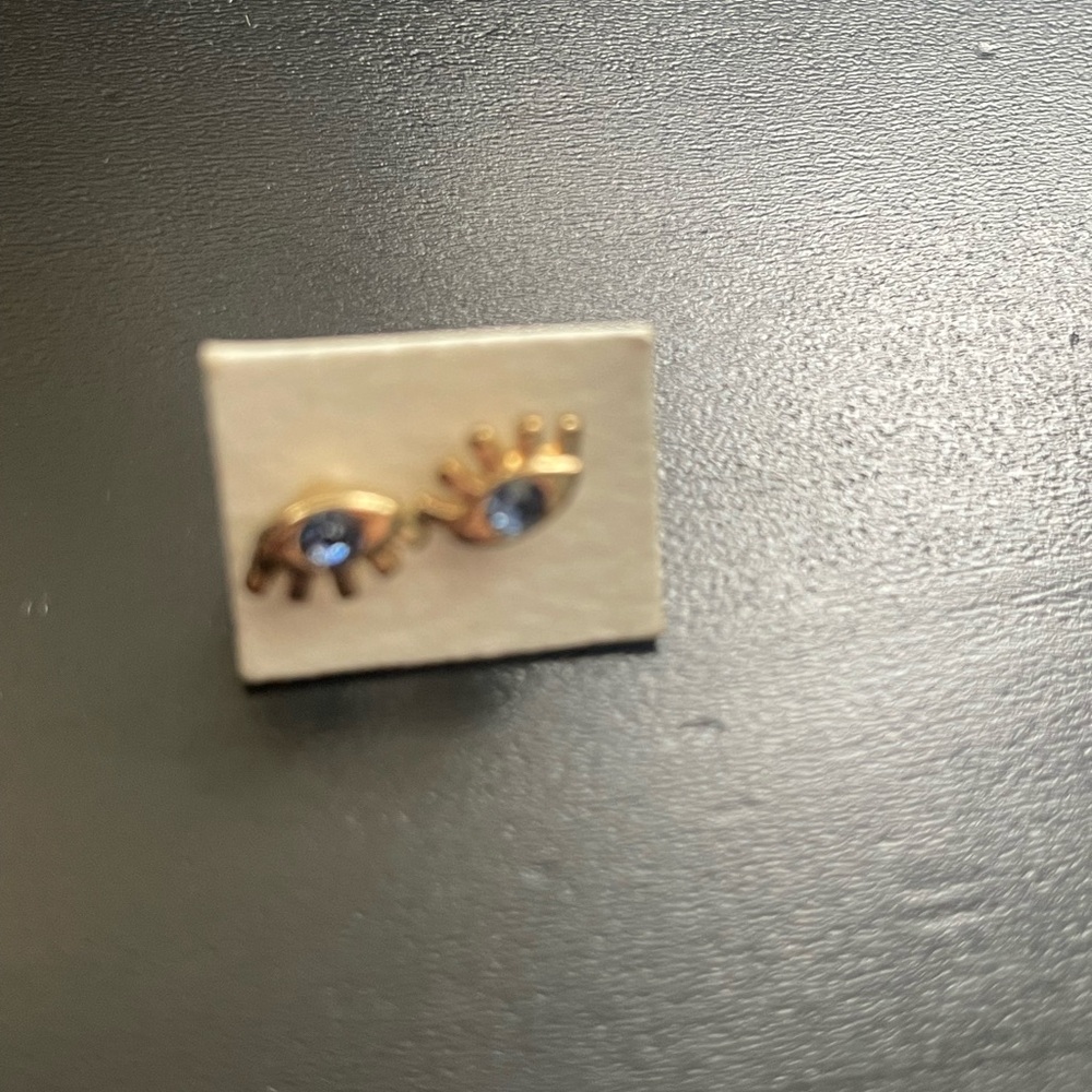Gold Eye Stud Earrings with Blue Stones